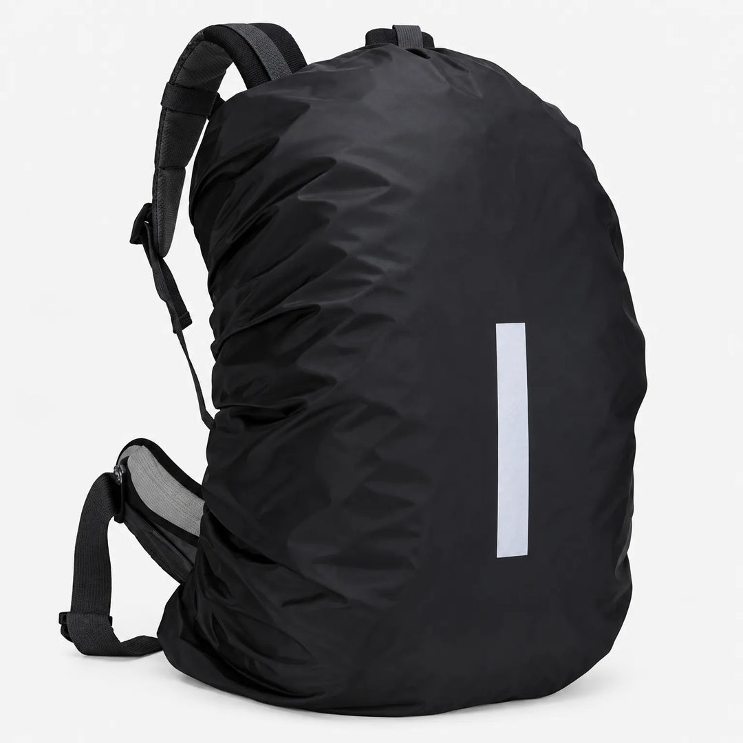 Three-quarter side view of a backpack wrapped in the black cover, showing the shoulder straps, hip belt and reflective strip. 4