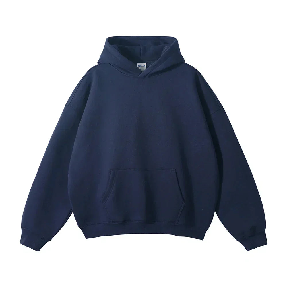Front view of the hoodie in navy blue, laid flat, with drop shoulders, a hood and a front kangaroo pocket.