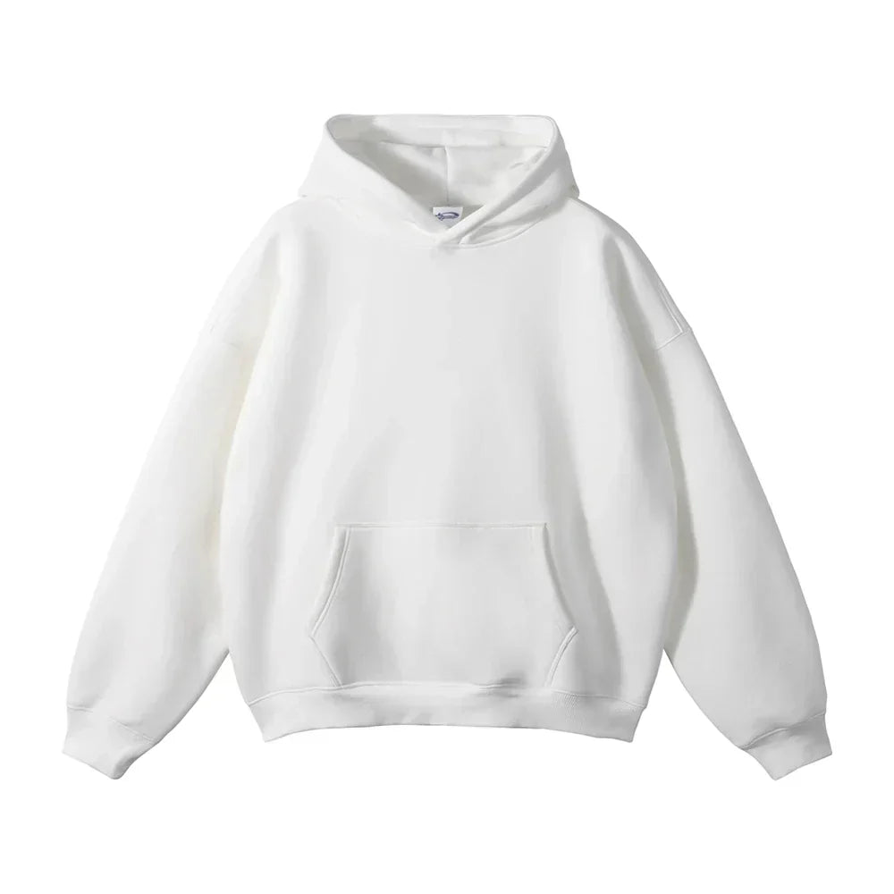 Front view of the hoodie in white, laid flat, with the kangaroo pocket, ribbed hem and soft hood.