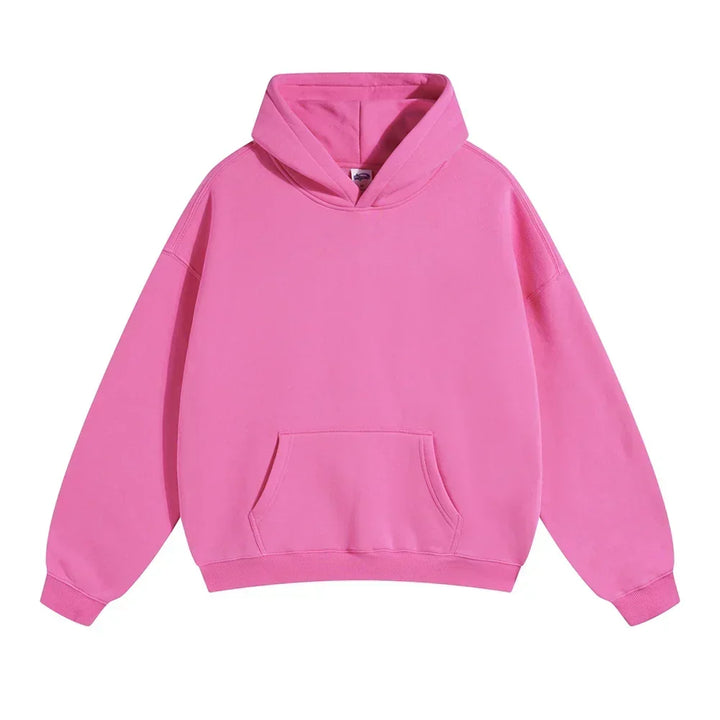 Front view of the hoodie in bright pink, laid flat, with the kangaroo pocket and ribbed cuffs and hem.