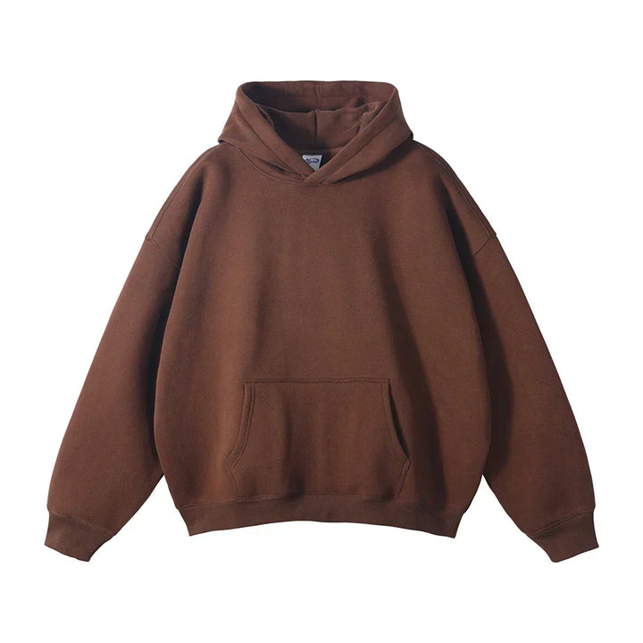 Front view of the hoodie in chocolate brown, laid flat, with the kangaroo pocket, ribbed cuffs and loose hood.