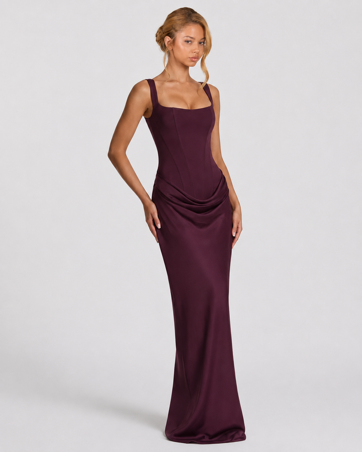 Plum maxi dress another view with a glossy drape and fitted long skirt.