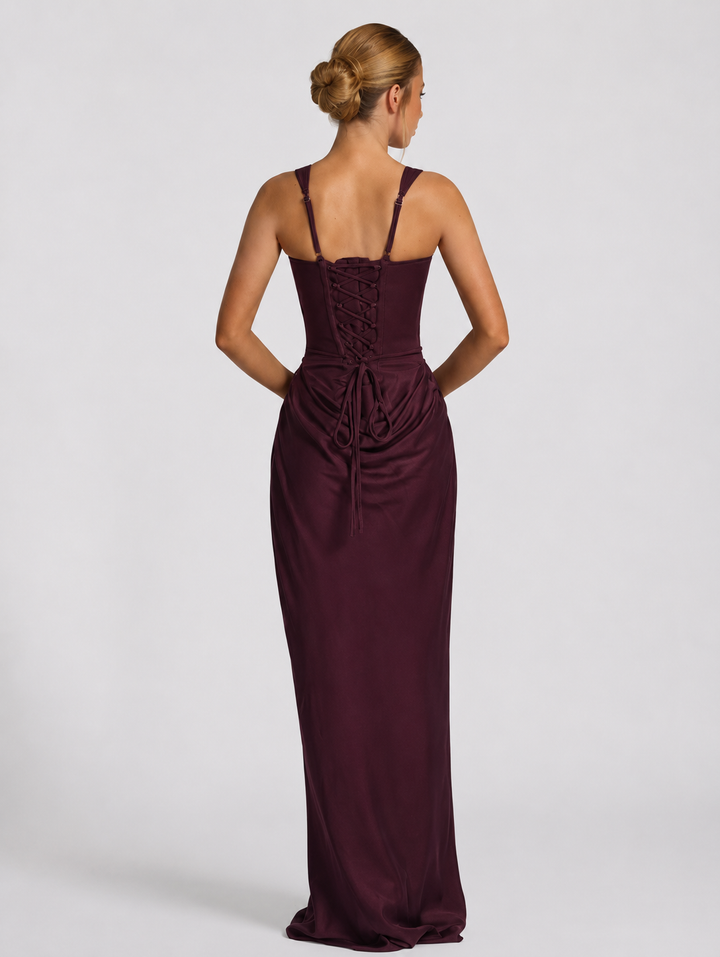 Plum maxi dress with a crisscross lace-up back and adjustable thin straps, back view.