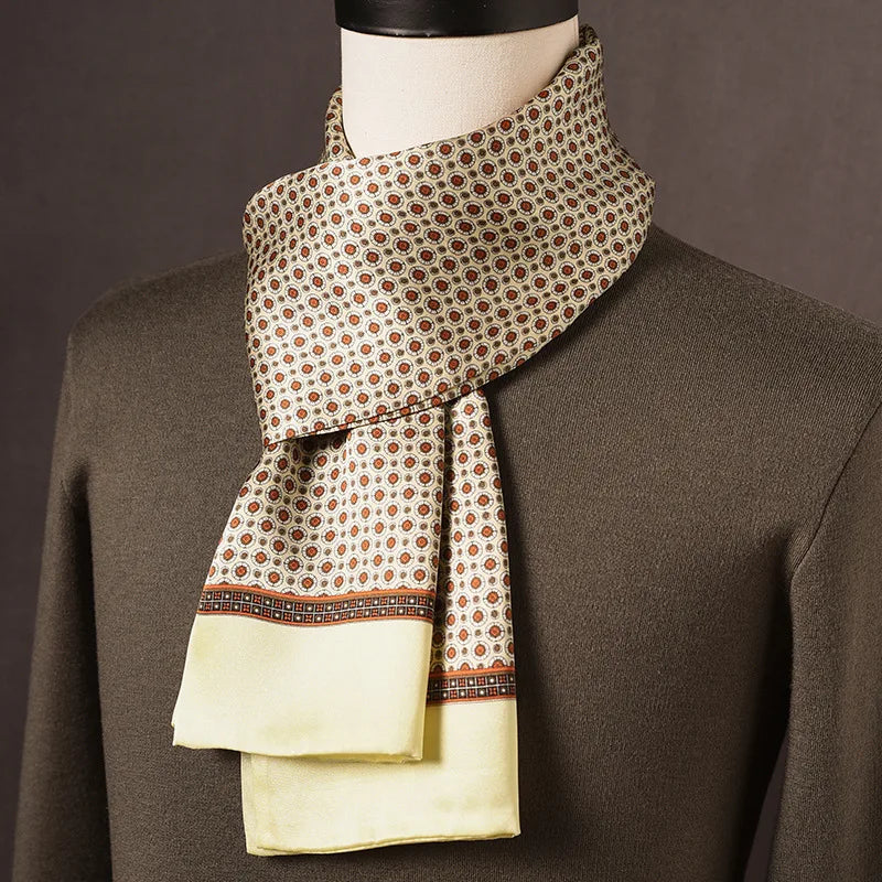 Men's cream silk scarf with small orange-brown medallion dots, a patterned stripe and a pale yellow border