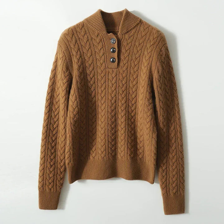 Caramel brown cable-knit sweater laid flat against a white background, showing the ribbed collar, three buttons and long sleeves. 17