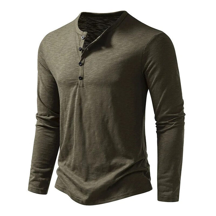Angled front view of the olive green long-sleeve Henley showing the buttons and fitted sleeves 5