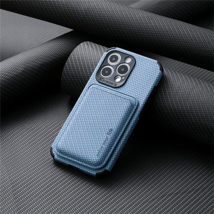 Blue woven wallet case with attached card pocket and black corner bumpers, displayed against dark carbon-style fabric 8