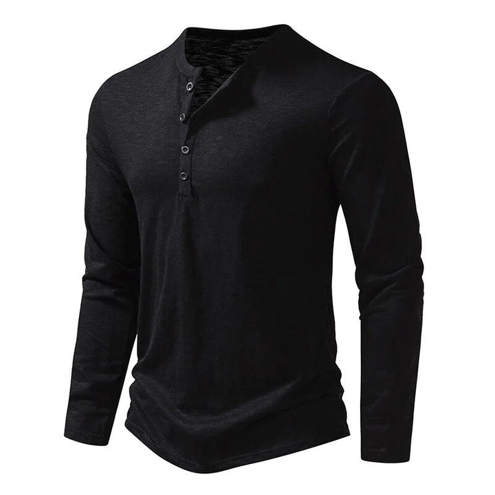Angled front view of the long-sleeve Henley in black showing the button placket 15