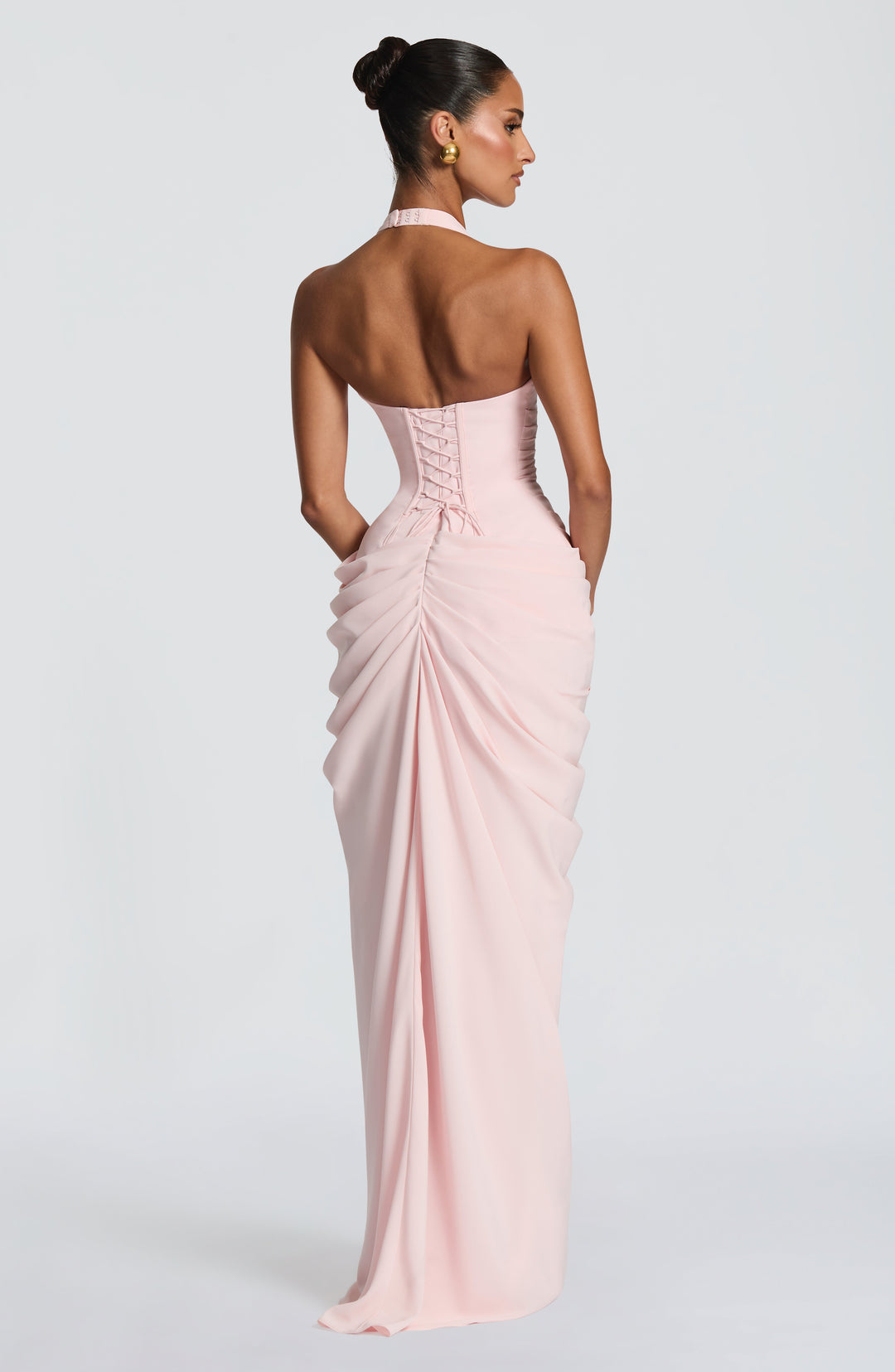 Pale pink halter maxi dress another view showing the corset lacing, halter closure and gathered back of the chiffon skirt.