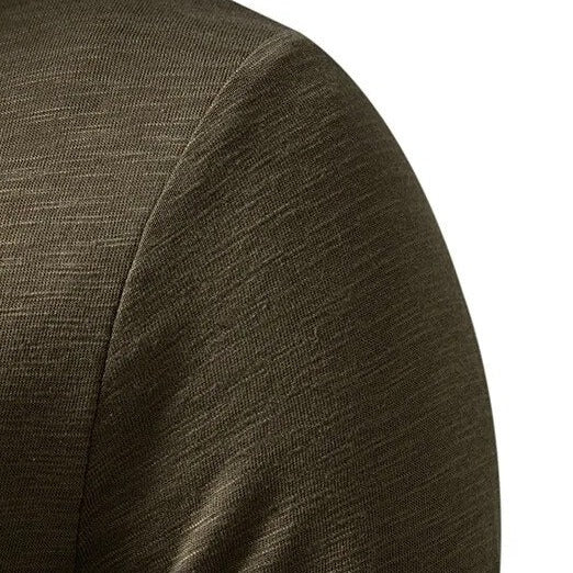Close-up of the olive green Henley shoulder and sleeve showing the slub cotton texture 8