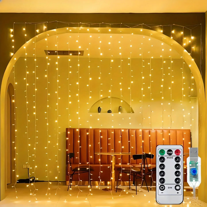 Warm white curtain lights hanging in a large arched doorway of a restaurant, with the remote and USB plug shown in the corner. 1