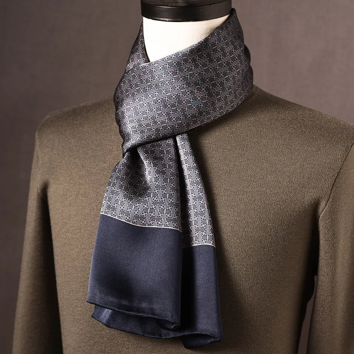 Men's gray and navy silk scarf with a geometric maze-like pattern and a solid navy border