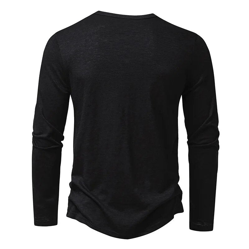 Back view of the black long-sleeve Henley with plain back and curved hem 17