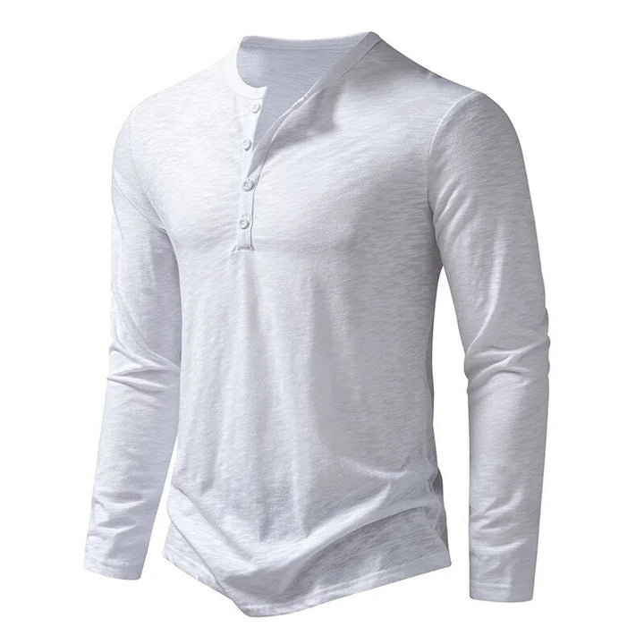 Angled front view of the white long-sleeve Henley showing the placket and slim sleeves 10