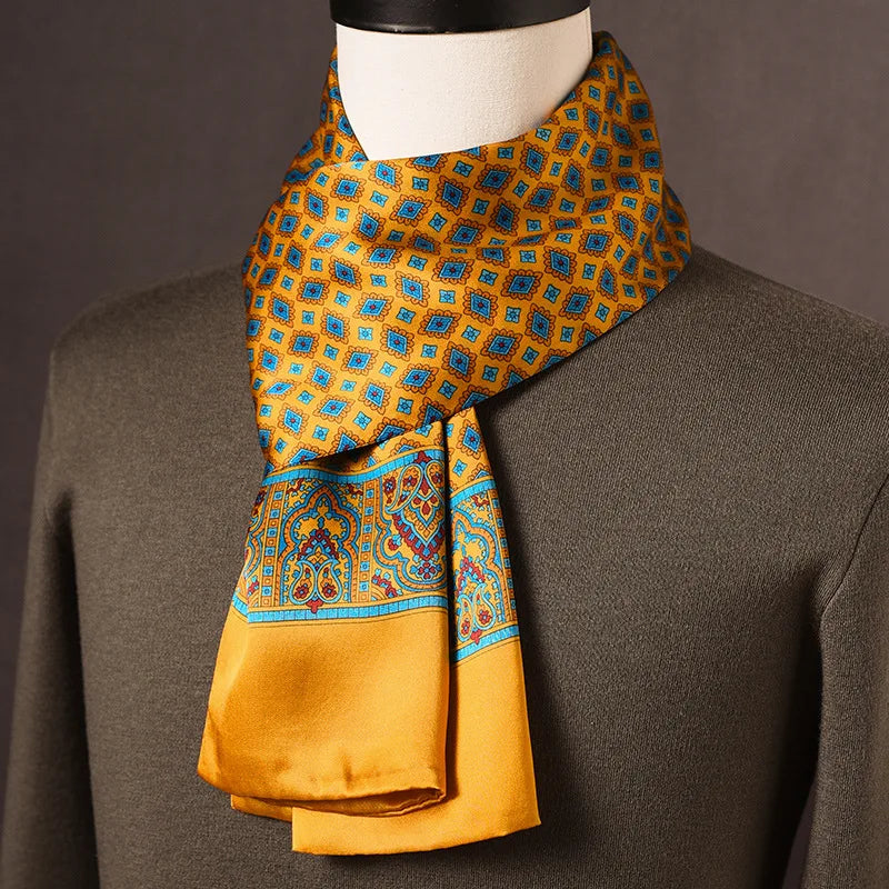 Men's golden yellow silk scarf with small blue diamond motifs and a paisley border at the ends