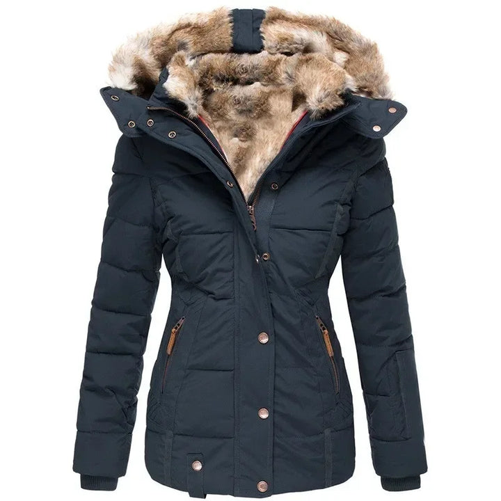 Navy blue quilted parka with thick faux fur hood lining, front view with zippered pockets 5