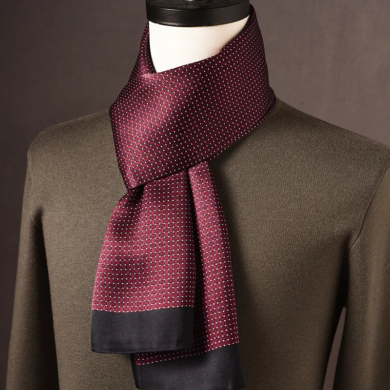 Men's burgundy silk scarf with a woven-look grid and tiny white dots and a dark navy border