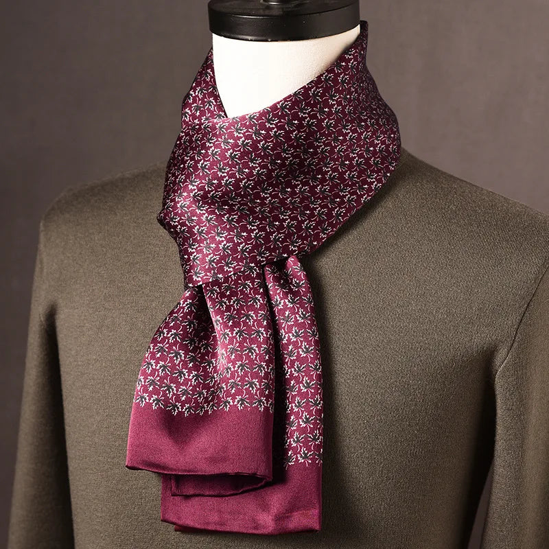 Men's burgundy silk scarf with a small dark and white floral print and a plain burgundy border