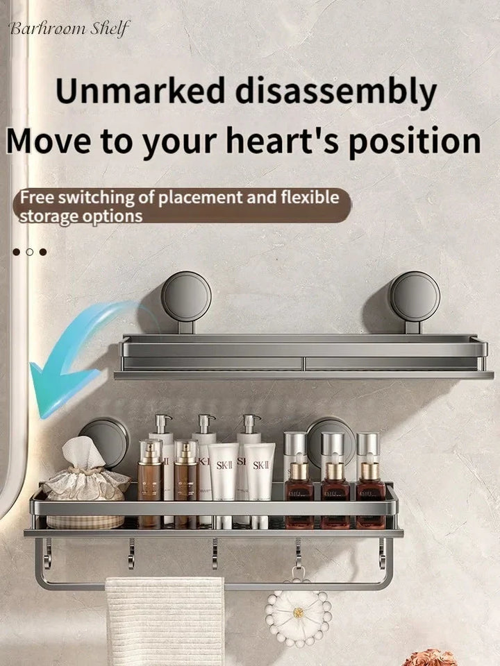Gray metal suction cup bathroom shelf another view with skincare bottles, hooks and a towel