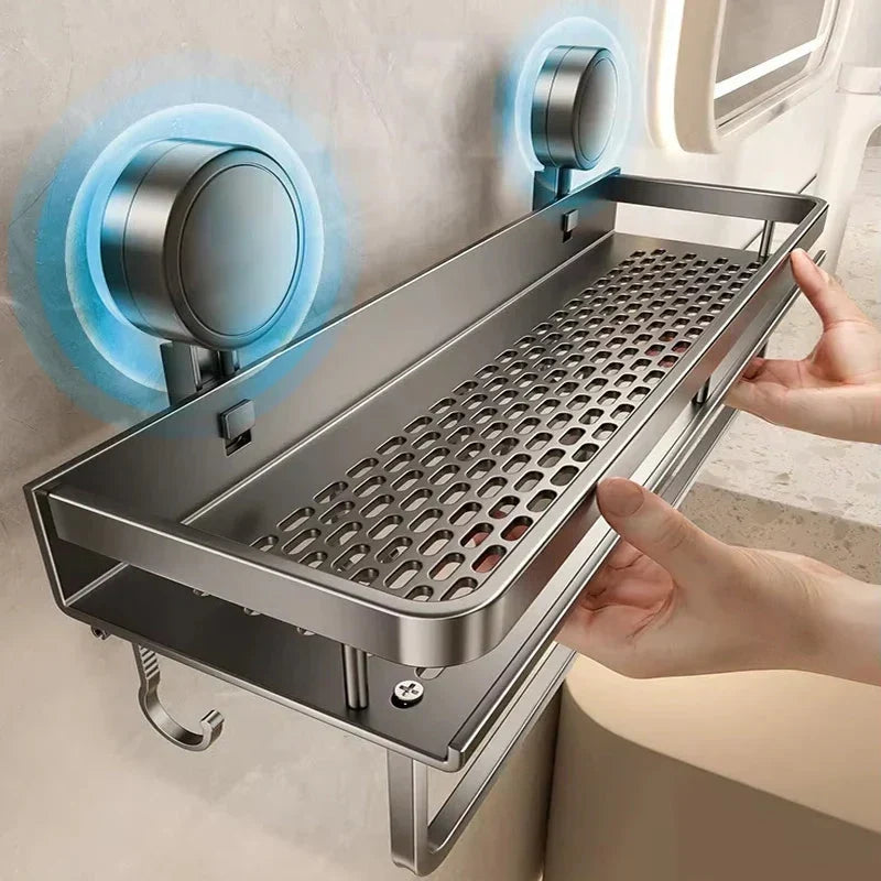Gray metal suction cup bathroom shelf on a wall with a perforated open frame