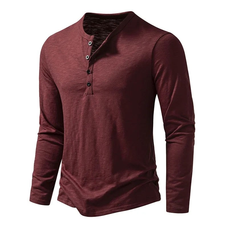 Angled front view of the long-sleeve Henley in burgundy with a four-button placket 12