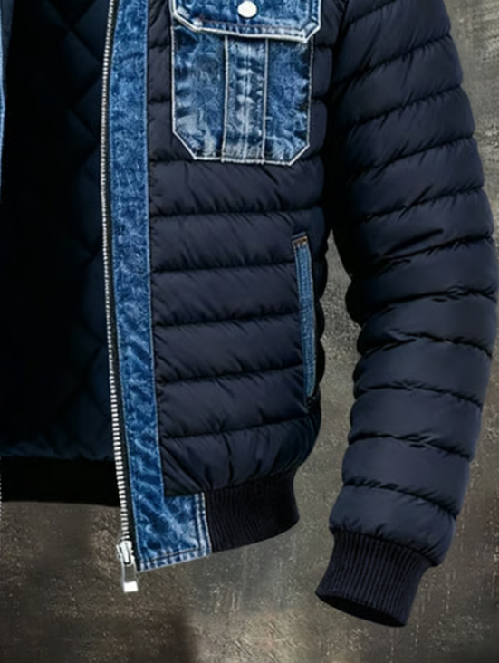 Men's blue quilted denim jacket another view showing quilted panels, side pocket, zipper end and ribbed cuff and hem.