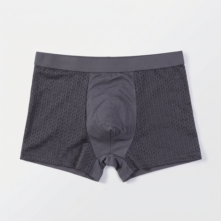 Flat lay of gray boxer briefs with perforated mesh side panels and a smooth center panel 4