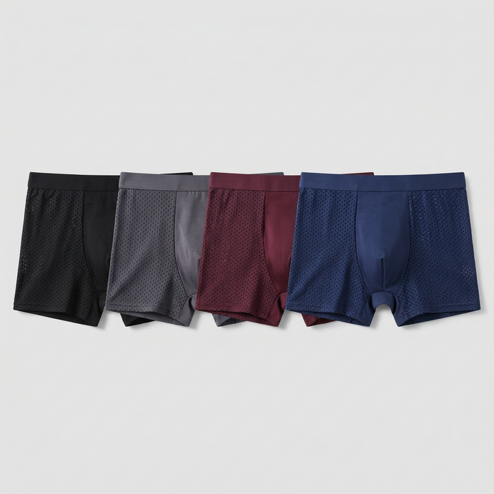 Flat lay of four boxer briefs in black, gray, burgundy and navy with mesh side panels 3