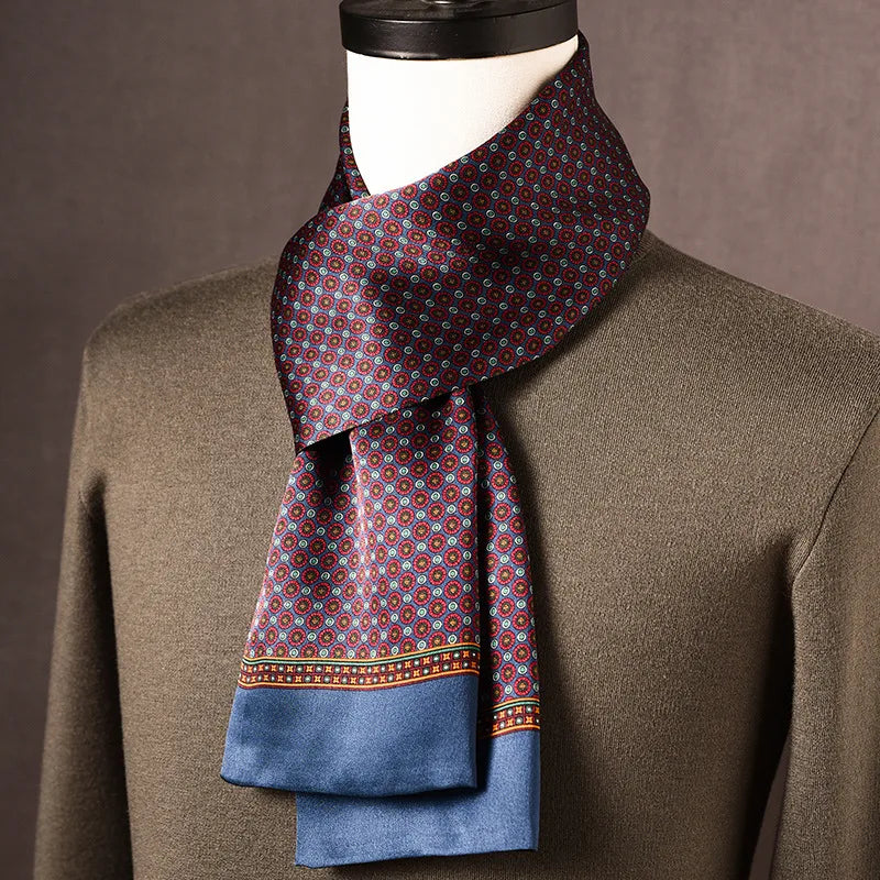 Men's silk scarf in burgundy with small red and blue medallion dots and a blue border