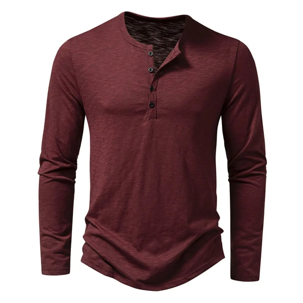Front view of the burgundy long-sleeve Henley with dark buttons and textured fabric 14