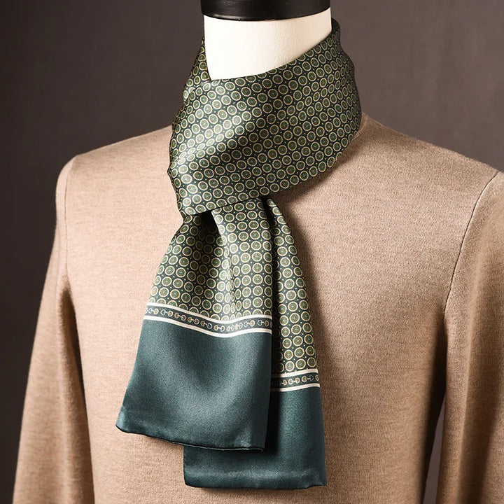 Men's green silk scarf with small cream circular motifs and a solid green border with a thin chain-style stripe