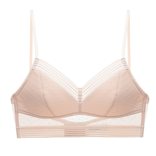 Beige bralette on a plain background, front view, with thin straps, striped V neckline and sheer dotted mesh panel. 11