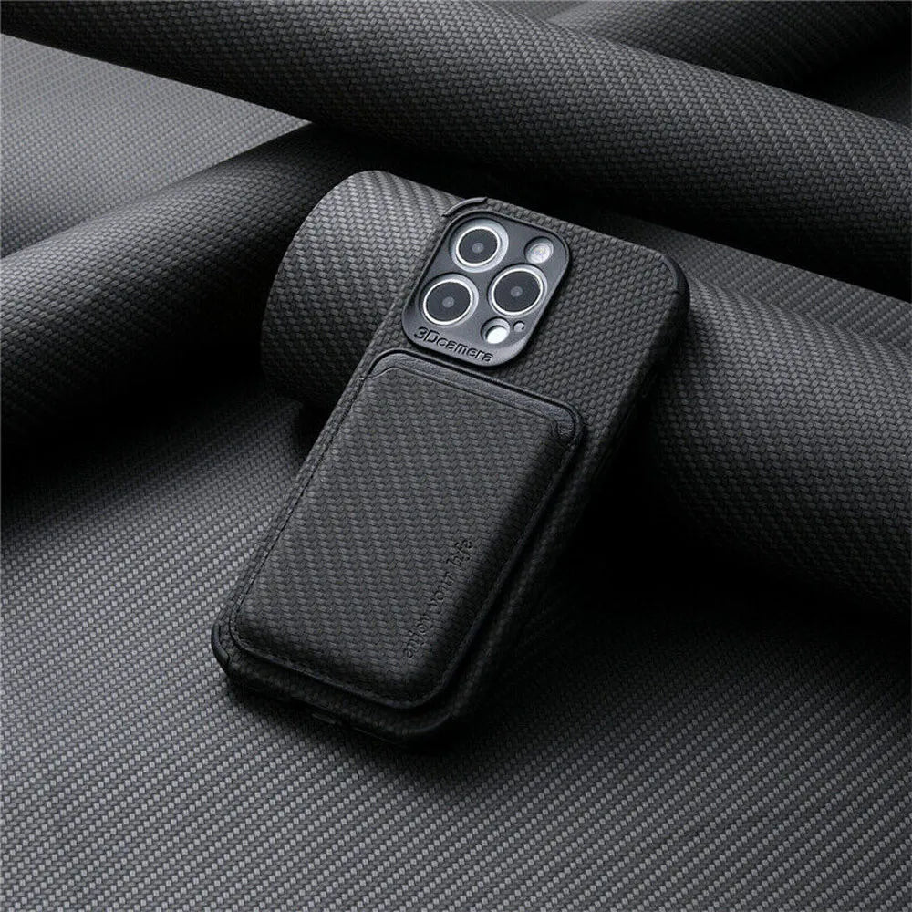 Black textured case with its card pocket attached, resting against rolled dark fabric 4