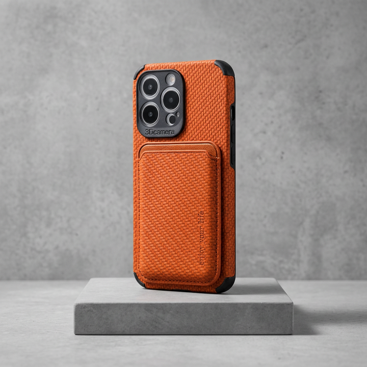 Orange woven-texture case with card pocket and black corners, standing upright on a gray concrete platform 6