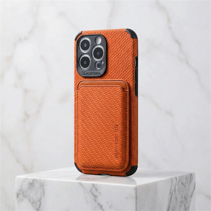 Orange woven-texture phone case with card pocket standing on a white marble block 6