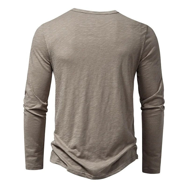 Back view of the taupe long-sleeve Henley with plain back, round neckline and curved hem 3