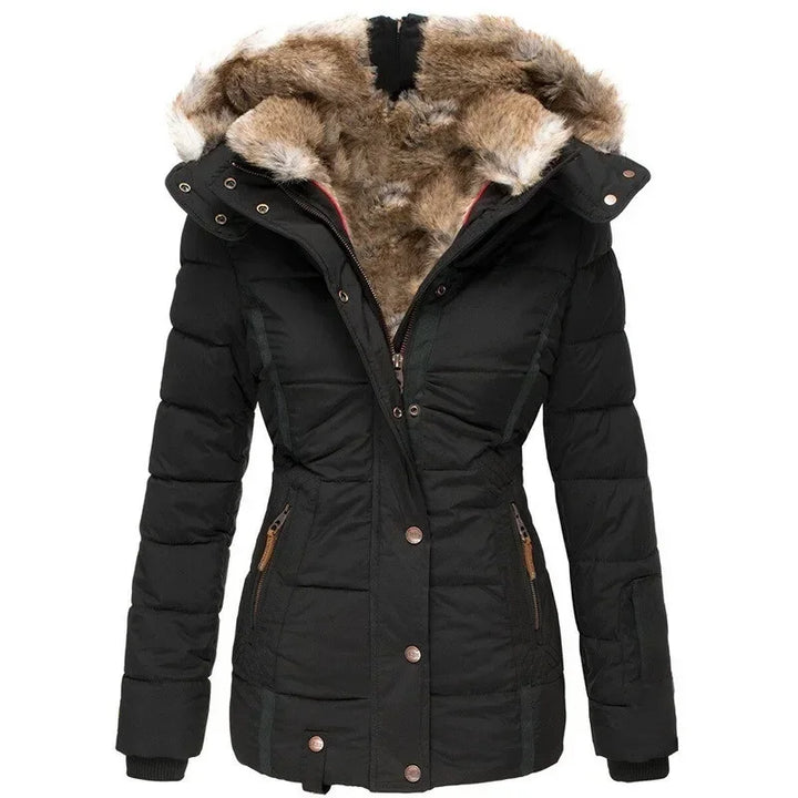 Black quilted parka with thick fur-lined hood, front view, copper snap buttons and ribbed cuffs 11