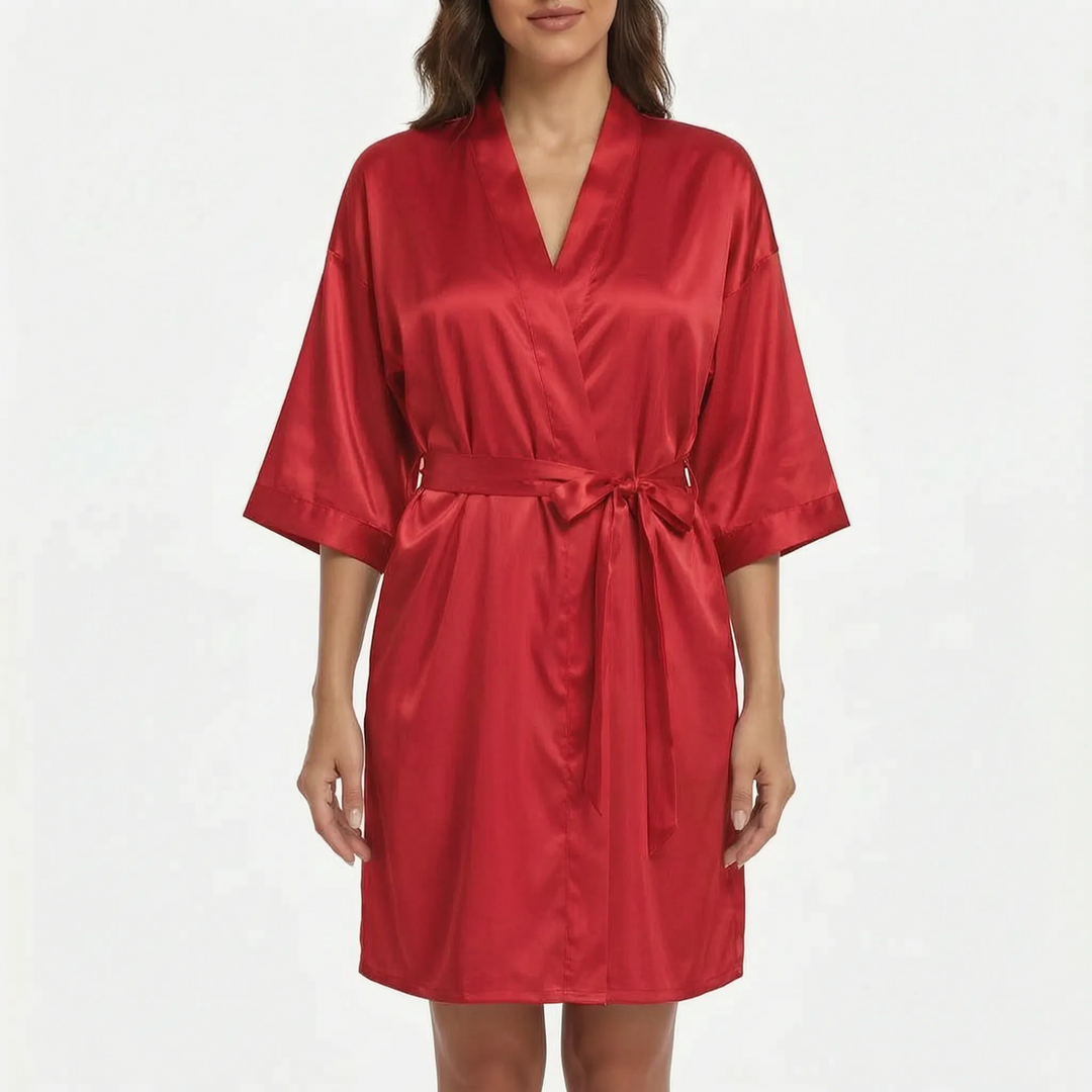 Model wearing the satin robe in bright red, front view with a belt tied in a bow. 11