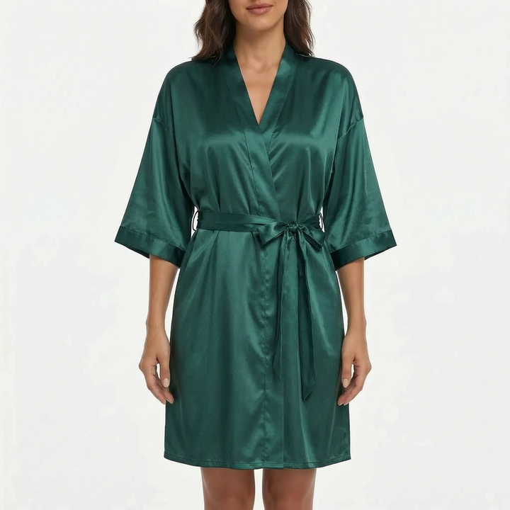 Model wearing the satin robe in dark emerald green, front view with a belt tied in a bow. 13