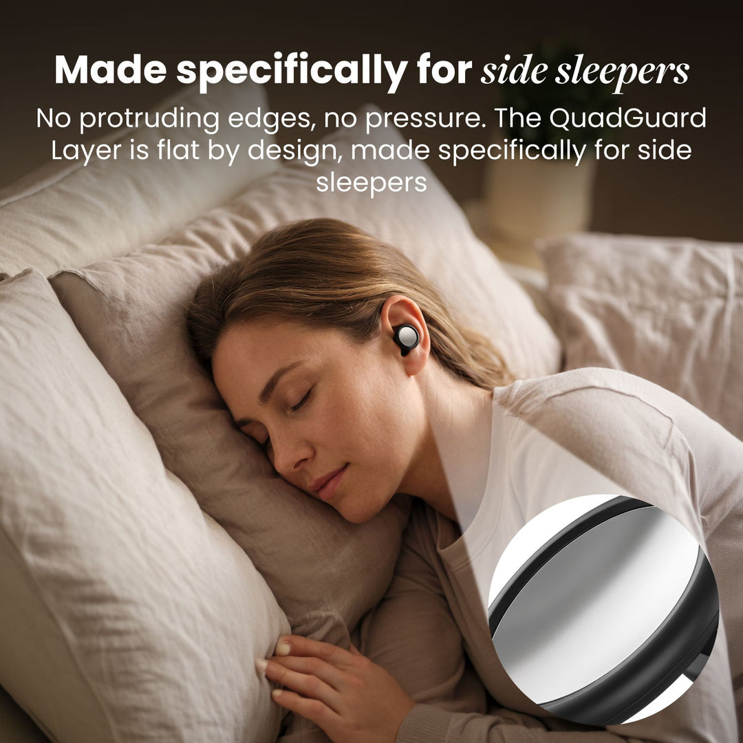 Woman sleeping on her side on pillows wearing a black earplug, with a close-up of its flat mirrored face 23