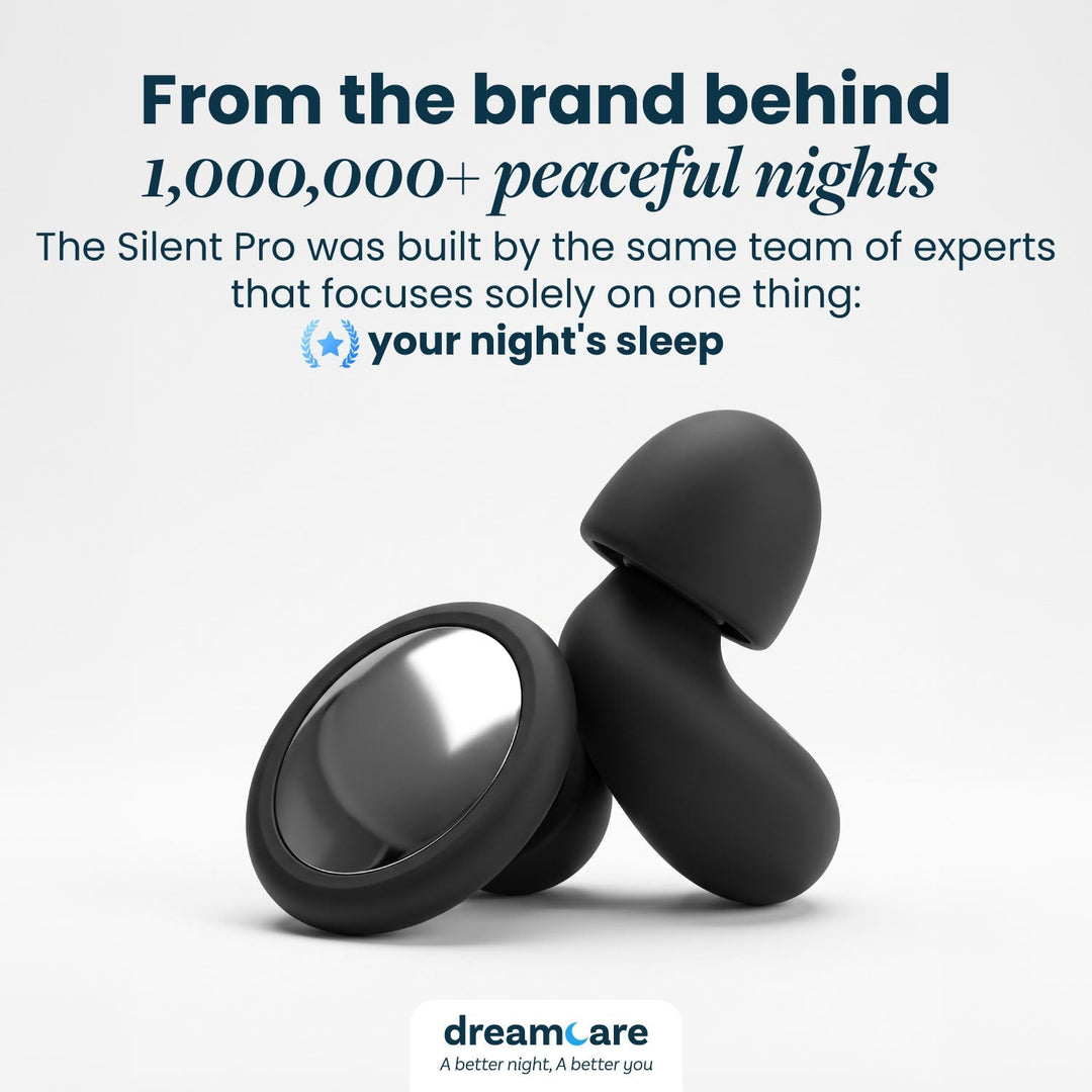 Pair of black silicone earplugs with mirrored metallic discs standing against a plain light background 24