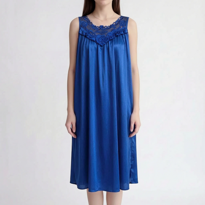 Royal blue version of the nightgown on a model, with a floral lace neckline, ruffle and loose knee-length cut. 10