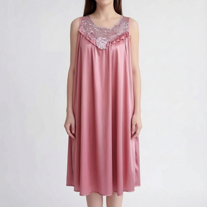 Dusty rose pink version worn by a model, with pink floral lace yoke, ruffle and loose satin drape. 7