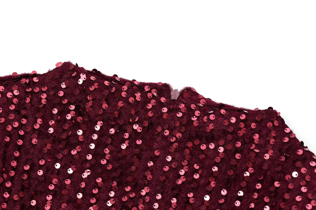 Close-up of burgundy sequined dress back neckline with a small zipper 13