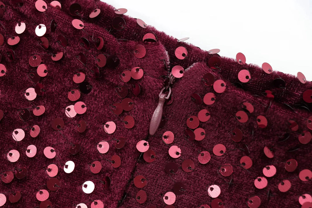 Detail of the burgundy dress back zipper pull surrounded by pink sequins on velvet 14
