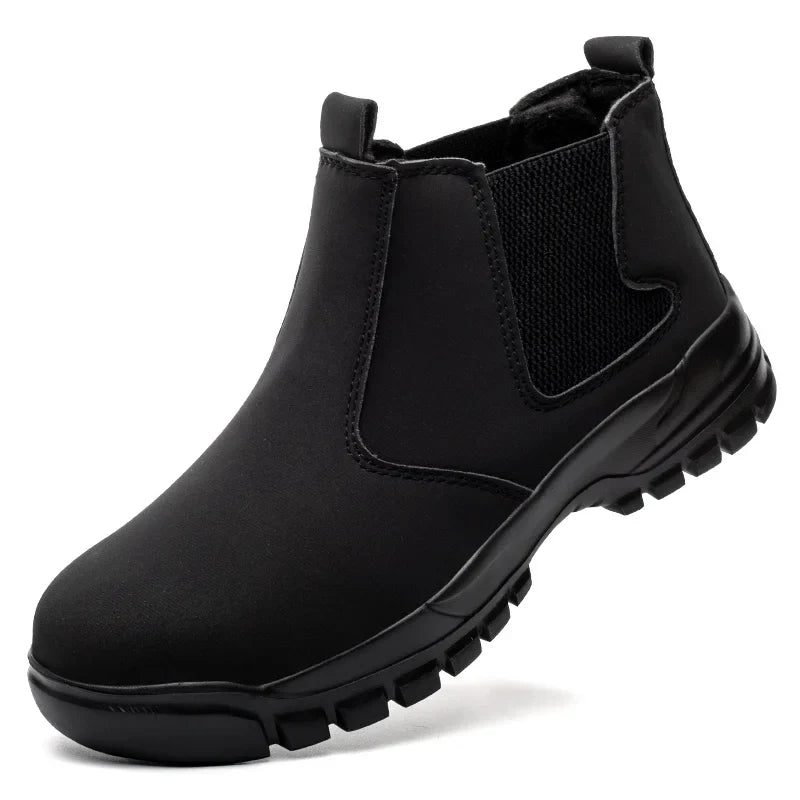 Single black slip-on boot on a white background, showing the elastic side panel and lugged sole 12