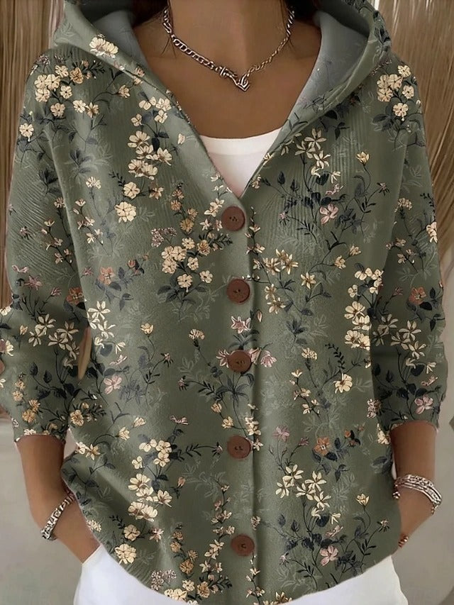 Sage green hooded cardigan with cream and pink wildflower sprigs.