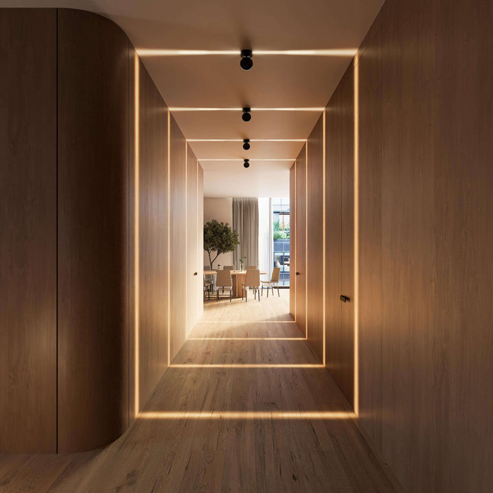 Black LED wall sconce another view showing square light frames on walls and floor in a hallway.