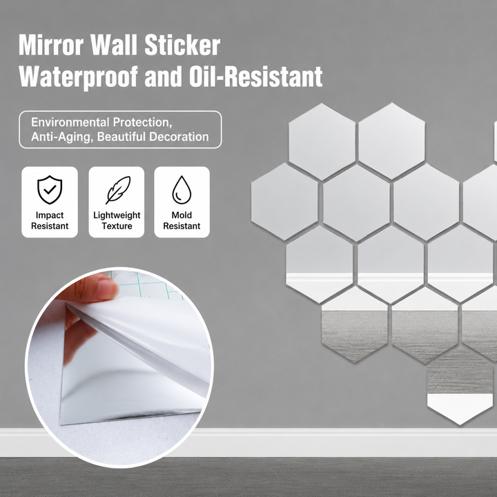 Hexagonal mirror stickers on a gray wall, with a hand peeling the backing off a sheet.