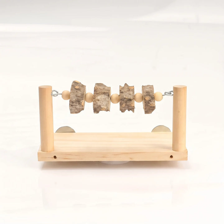 Front view of a light wood perch platform with two upright posts holding bark slices and wooden beads on a metal chain. 1